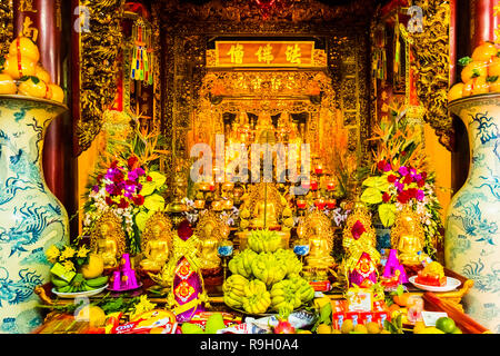 Main Altar of the Buddhist Temple Tran Quoc Pagoda, Symbol of Hanoi in Vietnam Stock Photo