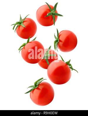 Falling tomato cherry isolated on white background, clipping path, full depth of field Stock Photo