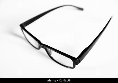 glasses on display on a table at an optician shop stock photo Stock Photo