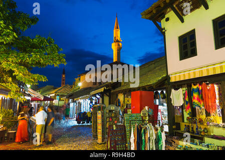 Night view of Karagoz Bey Mosque and cobblestone street in the old town, Mostar, Bosnia and Herzegovina Stock Photo