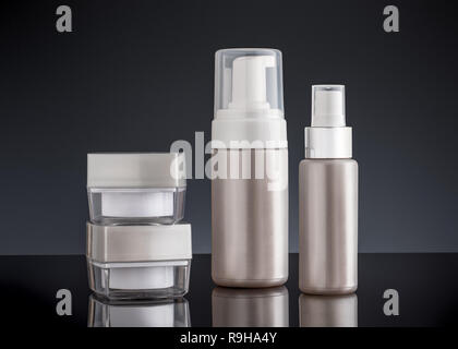 Bathroom and beauty packaging set without label and dark background. Stock Photo