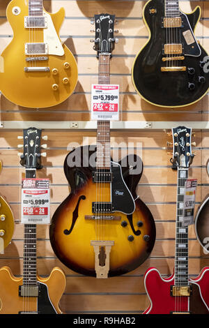 A Gibson L5 Studio Vintage guitar for sale for a mere $5799 at Sam Ash in Manhattan, New York City. Stock Photo