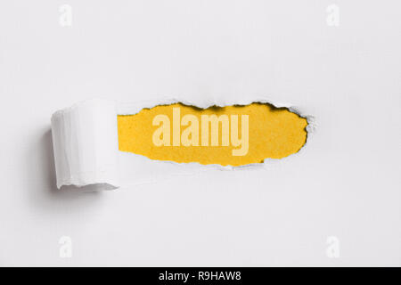 Torn white paper with yellow blank space for your text. Stock Photo