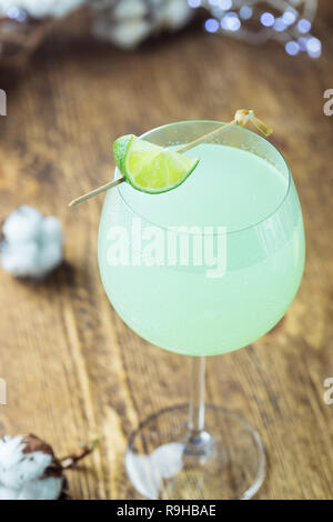 Refreshing green cocktail, summer drink with lime in a glass Stock Photo