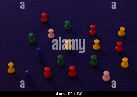 pins on blue board Stock Photo