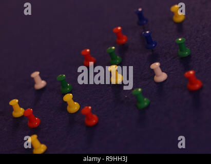 pins on blue board Stock Photo