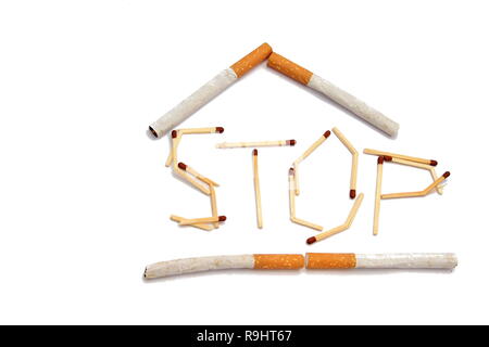 cigarette with matchsticks on white background stock photo Stock Photo