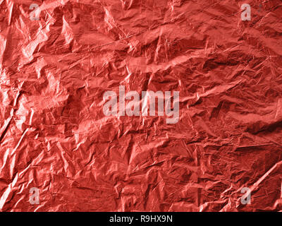 Abstract background made of Living Coral 2019 color. Festive backdrop for holidays and parties. Wrapping paper in Living Coral colour. Top view or fla Stock Photo