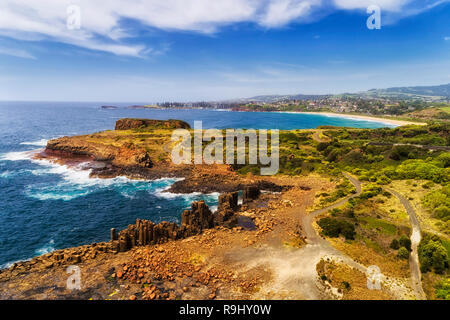 Basalt stone Bombo quarry in Kiama town on AUstralian pacific coast with unique hexagonal basalt pinnacles on a sunny summer light. Stock Photo