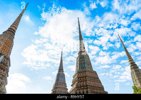 Ancient Thai temple with blue sky background at Bangkok, Thailand Stock Photo