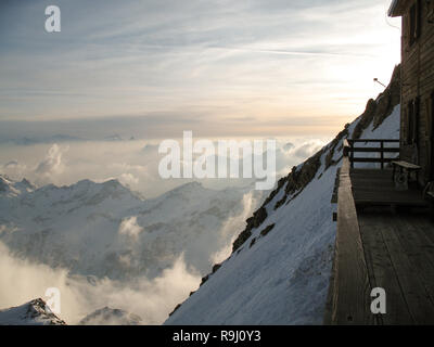 balcony of the mountain hut on top of Signalkuppe with a great view of the Alps around Zermatt in the Monte Rosa range in Switzerland Stock Photo