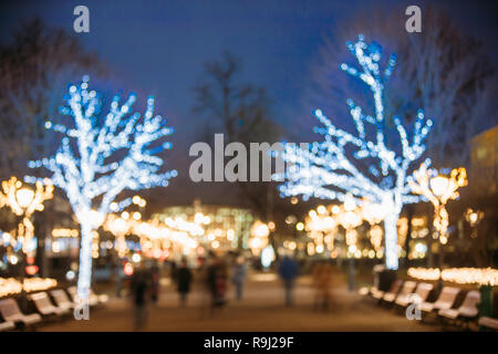 Helsinki, Finland. Defocused Blue Bokeh Background Of Esplanadi Park In Lighting At Evening Night Festive Illumination. Winter Christmas Xmas Holiday  Stock Photo