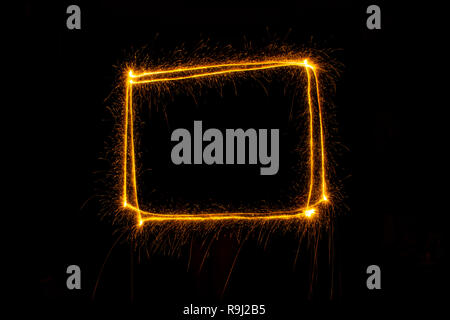 Abstract sparkler firework light on black background. Long exposure pattern Stock Photo