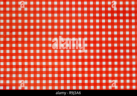 Red surface of the gift wrap background of New Year and Christmas for design in your work texture background. Stock Photo