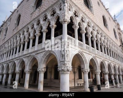 VENICE, ITALY, NOV 1st 2018: Doges Palace detailed facade or exterior perspective view. Ancient Italian renaissance architecture. Famous historic venetian landmark on San Marco Square or Piazza Nobody