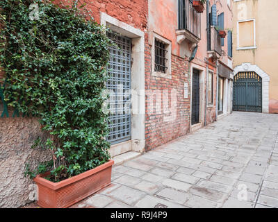 VENICE, ITALY, Nov 1st 2018: Renaissance architecture closeup perspective exterior or facade view on venetian street or inside garden. Nobody. Classic italian cityscape.