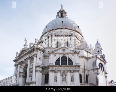 VENICE, ITALY, NOV 1st 2018: Santa Maria della Salute Church or Basilica facade or exterior view. Perspective exterior side view from ground Baroque venetian or italian architecture.