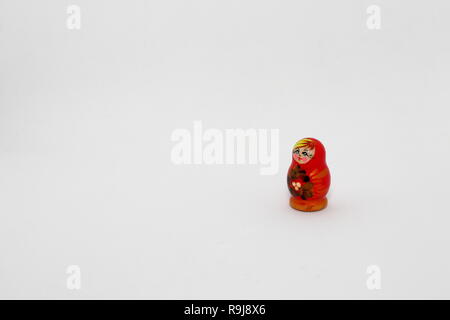 Cute Mini matryoshka, Russian dolls Isolated on white background. Stock Photo