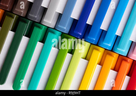 Multi-colored markers in white packaging, laid on the diagonal, positive learning Stock Photo