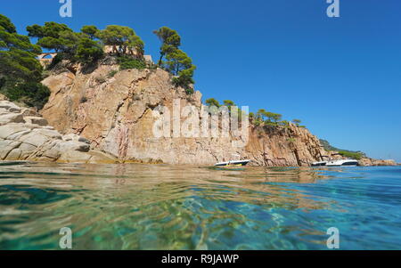 Spain Mediterranean coastline rocky cliff seen from sea surface, Aiguablava, Begur, Catalonia, Costa Brava Stock Photo