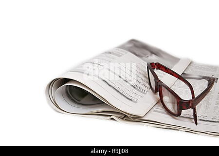 newspaper piled up on a table in a office no people stock photo Stock Photo