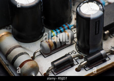 Resistor, Capacitor and Diode on Circuit Board close up. electronic hardware Stock Photo