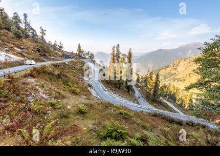 Scenic landscape with aerial view of Himalayan road and distant mountain ranges at Munsiyari Uttarakhand India. Stock Photo