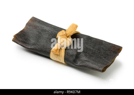 Single traditional dried and seasoned  kelp roll, kobumaki, isolated on white background Stock Photo