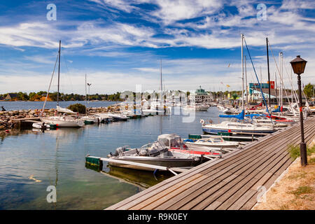 OSLO, NORWAY - JULY 23, 2018: Docked yachts and motorboats at Kongen (King) marina, Frognerstranda shoreline, Frognerkilen bay, Oslofjord. Bygdoy peni Stock Photo