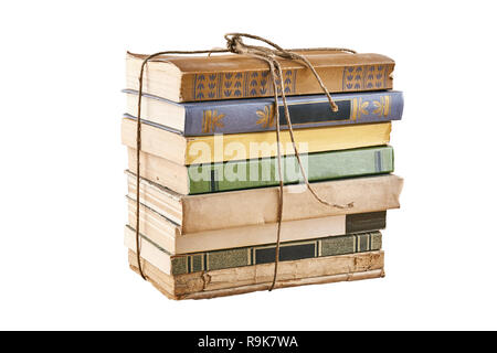 Bundle of old books tied up with string. Isolated on white background. Stock Photo