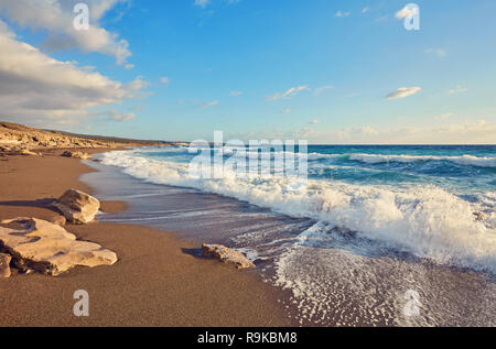 Storming sea and wide-spreading waves, Cyprus coastline. Stock Photo