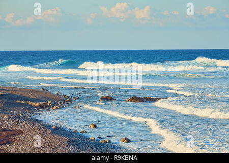 Storming sea and wide-spreading waves, Cyprus coastline. Stock Photo