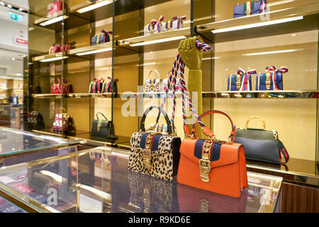 ROME, ITALY - CIRCA NOVEMBER, 2017: bags on display at a Gucci store in Fiumicino International Airport. Stock Photo