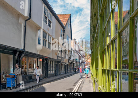 York, England - April 2018: Shops along Minster Gates street near York Minster in historic district of City of York, England, UK Stock Photo