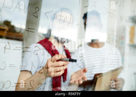 Code notes on board Stock Photo