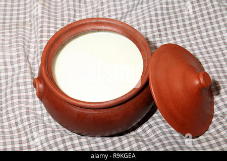 Homemade yogurt in clay pot Stock Photo