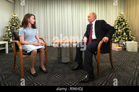 Young blind journalist Regina Parpiyeva, 17, during an exclusive interview with Russian President Vladimir Putin following the annual news conference at the Kremlin December 20, 2018 in Moscow, Russia. Parpiyeva is a participant in the Dream with Me charity project supported by Putin.