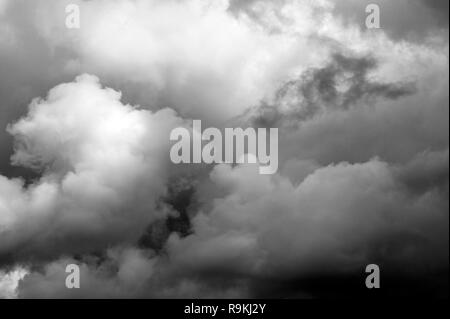 Cumulus congestus clouds with dramatic ominus clouds Stock Photo