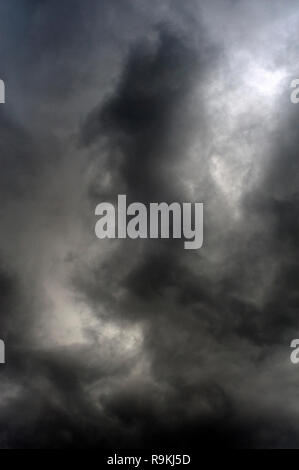 Cumulus congestus clouds with dramatic ominus clouds Stock Photo