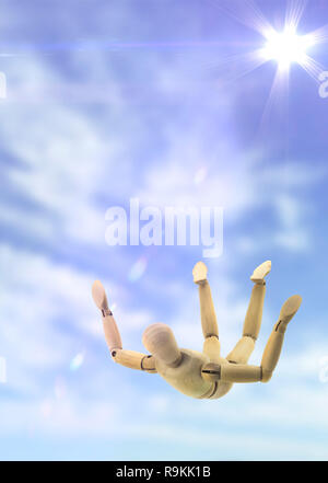 A wooden mannequin in a ballet pose, on it's base, on a white surface Stock  Photo - Alamy