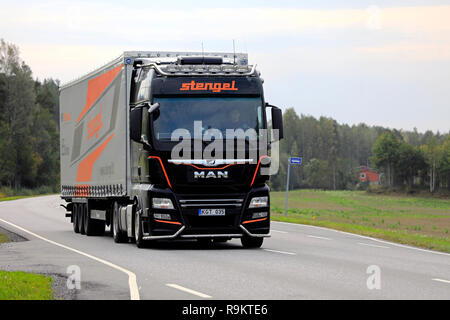 Salo, Finland - September 21, 2018: Customised MAN semi trailer truck of Stengel LT hauls goods on rural highway in South of Finland on day of autumn. Stock Photo