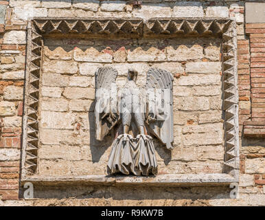 Eagle symbol on the Porta della Catena in Todi, Province of Perugia, Umbria, Italy. Stock Photo
