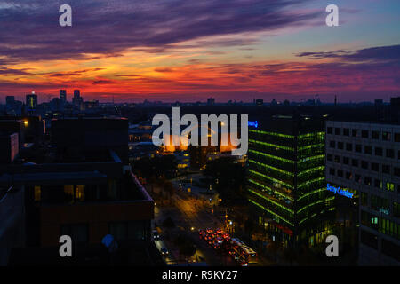 Spectacular sunset over the philharmonic orchestra hall in Berlin, Germany. Stock Photo