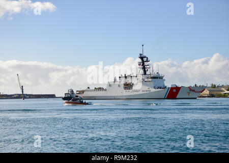 The crew of USCGC Kimball (WMSL 756) arrive in Honolulu Dec. 22, 2018, escorted by members of Maritime Safety and Security Team Honolulu. Known as the Legend-class, NSCs are designed to be the flagships of the Coast Guard’s fleet, capable of executing the most challenging national security missions, including support to U.S. combatant commanders. (U.S. Coast Guard photo by Chief Petty Officer Sara Muir/Released) Stock Photo