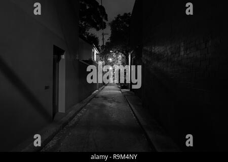 Dark And Eerie Urban City Alley At Night Stock Photo Alamy