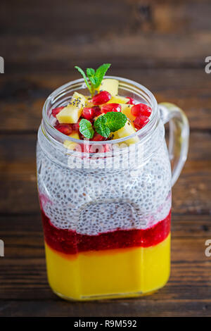 Chia seed pudding in jar with mango. Healthy breakfast. Sweet healthy dessert. Stock Photo
