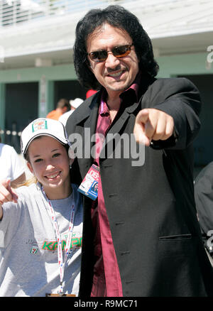 Gene Simmons of Kiss and Lynne Dee Brewer enjoy a moment in the garage area prior to running the Toyota Indy 300 at Homestead Miami Speedway in Homestead, Florida on March 26, 2006. Stock Photo