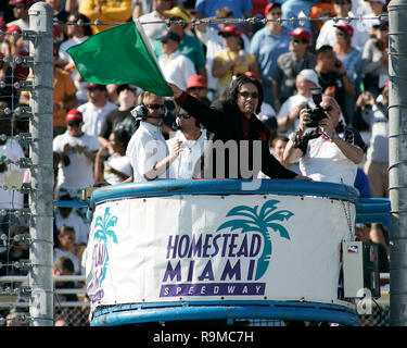 Honorary starter Gene Simmons waves the green flag starting the Toyota Indy 300 at Homestead Miami Speedway in Homestead, Florida on March 26, 2006. Stock Photo