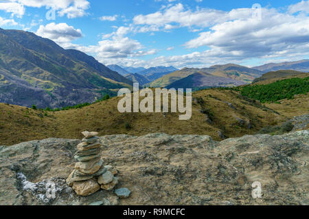 hiking the queenstown hill walkway in the mountains, otago, new zealand Stock Photo