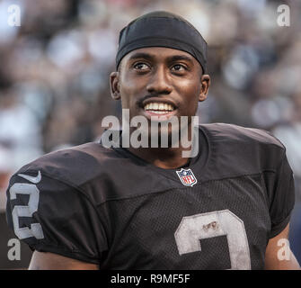 Oakland, California, USA. 13th Aug, 2012. Oakland Raiders defensive back  Mike Mitchell (34) celebrates early interception on Monday, August 13,  2012, in Oakland California. Cowboys defeated the Raiders 3-0 in a preseason